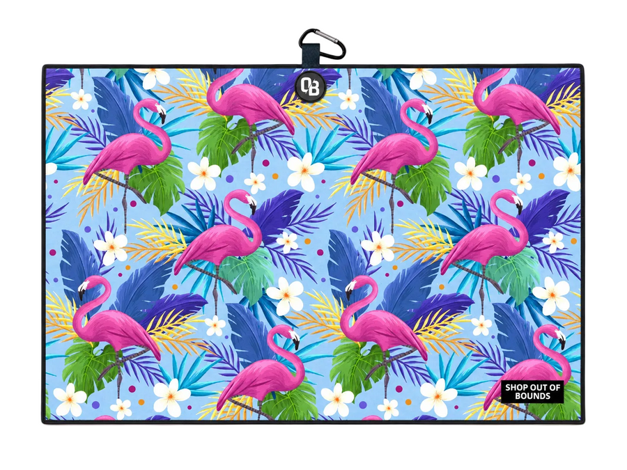 A rectangular tote bag with a tropical flamingo print, featuring pink flamingos, green and blue leaves, and white flowers on a light blue background, with a black carabiner clip at the top.