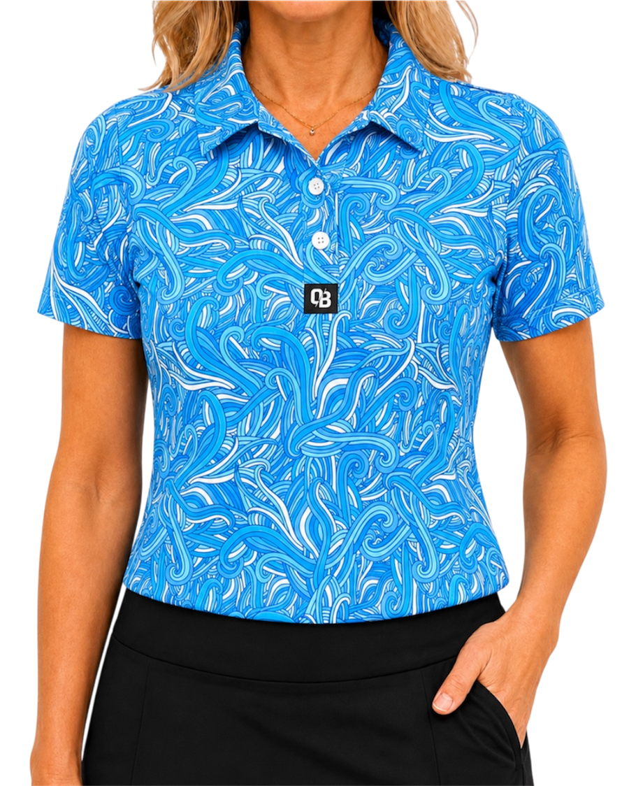 Birdie Wave women’s short sleeve golf polo with blue and white wave print