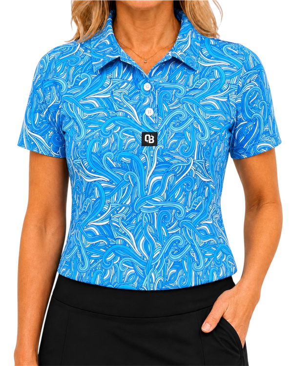 Birdie Wave women’s short sleeve golf polo with blue and white wave print