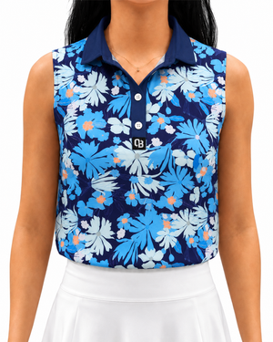 Flower Power women’s sleeveless golf polo with blue floral print and orange accents